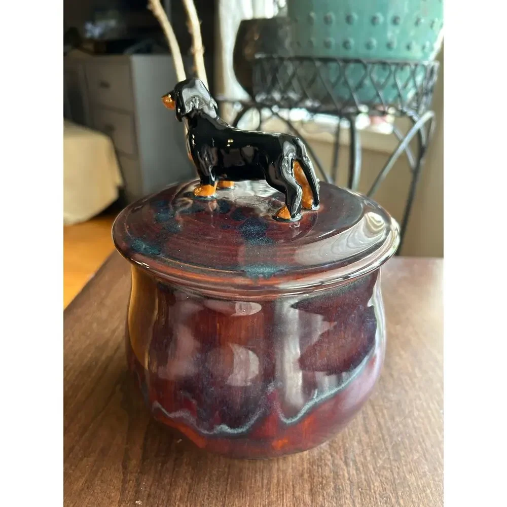 Mudipaws Pottery ceramic treat jar topped w/ a dachshund by artist Debi Manduca